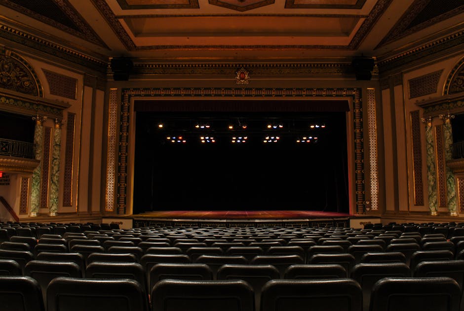 Elegant entertainment hall with crystal chandeliers and plush seating