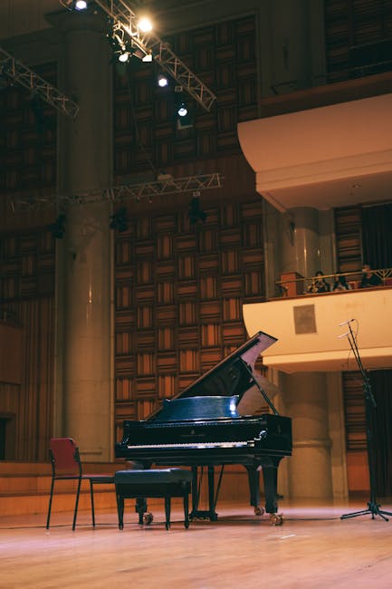 Luxurious event hall with elegant lighting and stage setup