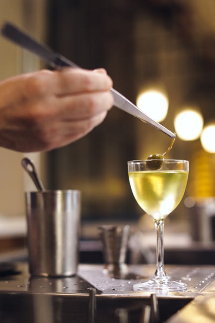 Professional staff serving refreshments at an elegant bar